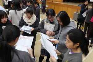 Class teacher is giving advice to her students in course selection.