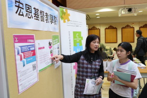 Institution representative is introducing the school to students.