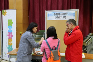 Parents are listening to the staff explaining the study pathways in Mainland.